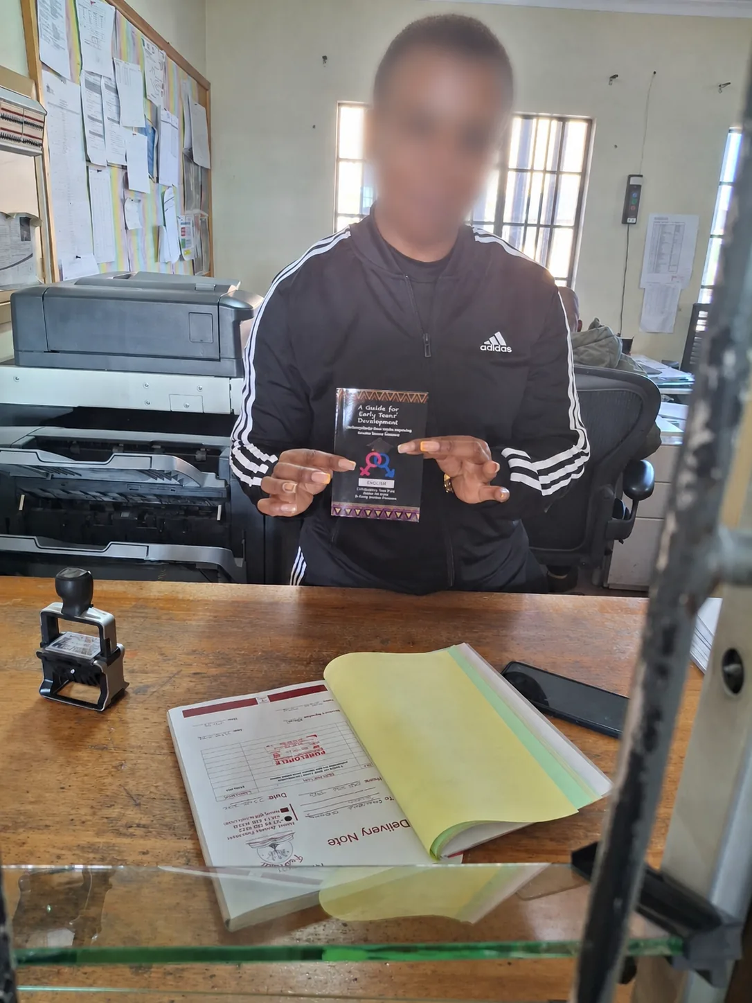 Bulk Educational Booklet Printing for School Distribution – Case Study School booklet distribution with faces blurred for privacy