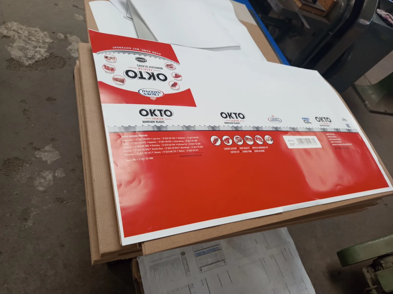 Custom Printed Corrugated Boxes for First Cut – OKTO Premium Bandsaw Blades Lithographically printed OKTO packaging sheet prepared for E-flute corrugated box conversion