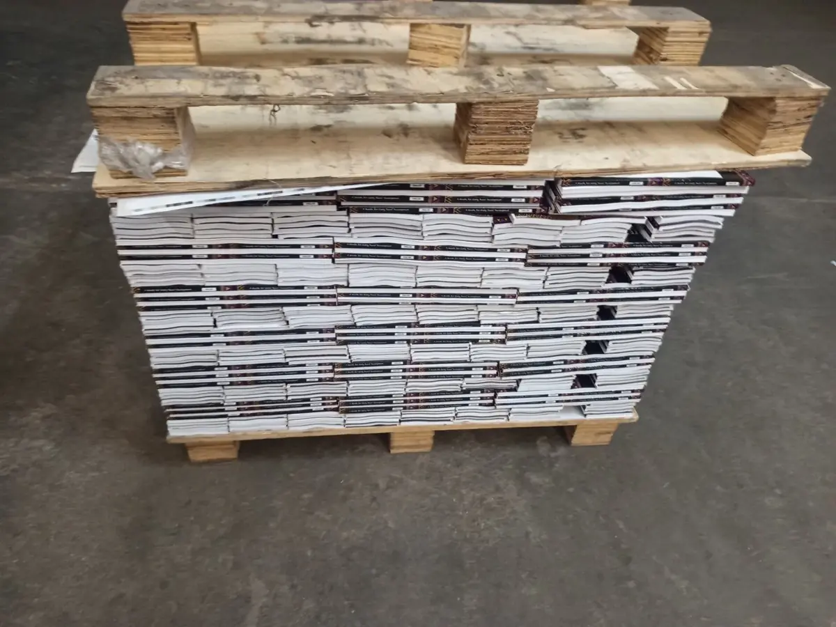 Bulk printed books prepared on a pallet for dispatch